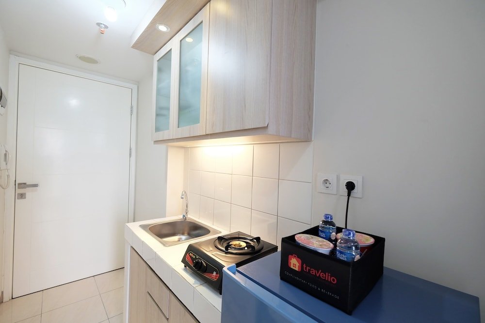 minimalist studio room at the springlake apartment sumarecon bekasi