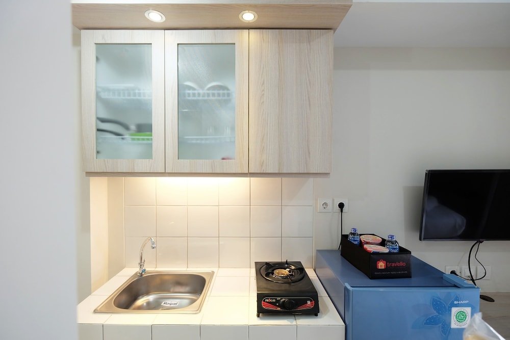 minimalist studio room at the springlake apartment sumarecon bekasi