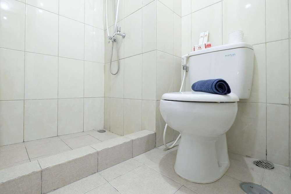 minimalist studio room at the springlake apartment sumarecon bekasi