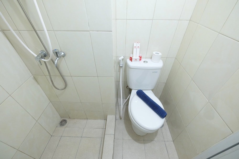 minimalist studio room at the springlake apartment sumarecon bekasi