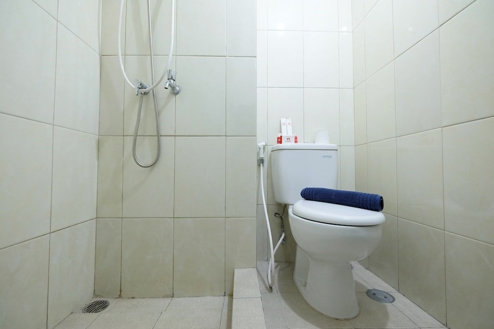 minimalist studio room at the springlake apartment sumarecon bekasi