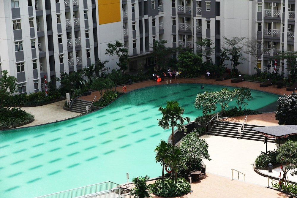 minimalist studio room at the springlake apartment sumarecon bekasi