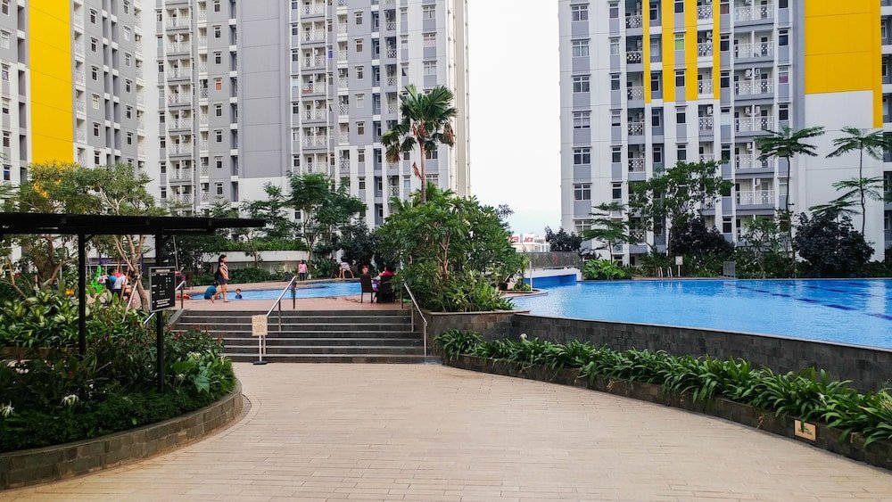 minimalist studio room at the springlake apartment sumarecon bekasi