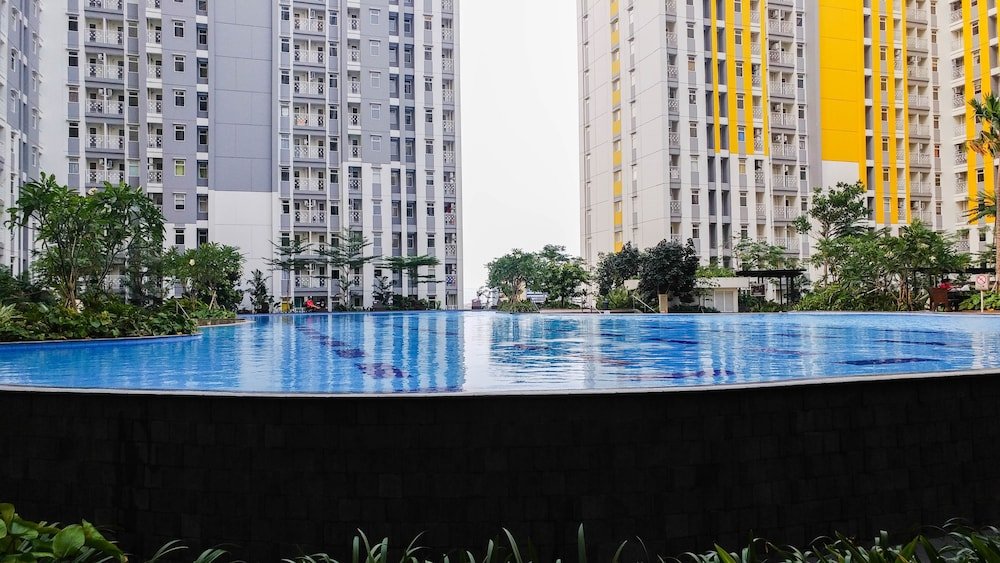 minimalist studio room at the springlake apartment sumarecon bekasi