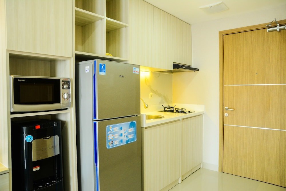 sophisticated studio at the oasis apartment