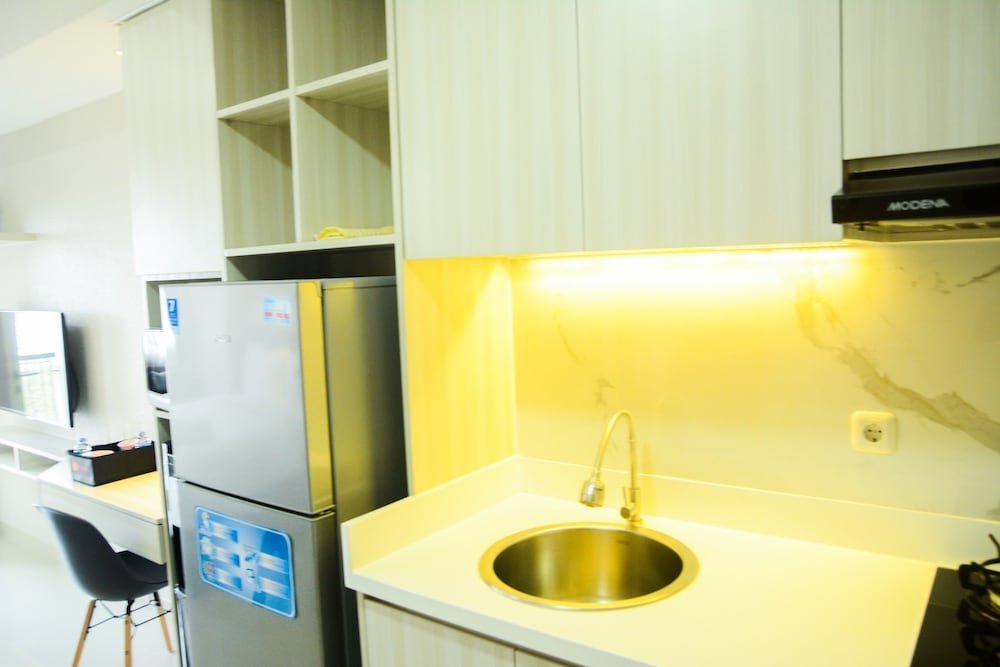 sophisticated studio at the oasis apartment