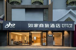 home inn xishuang banna bbidge riverside night market snack street