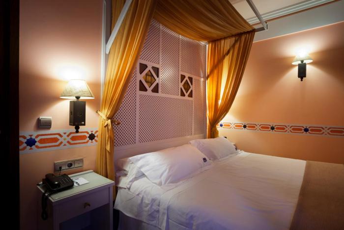 suites gran via 44 apartahotel