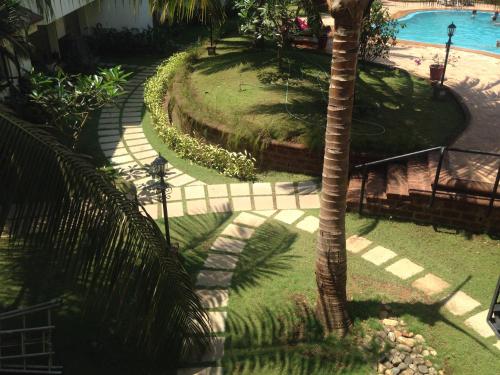pool facing apartment in riviera foothills near baga arpoara