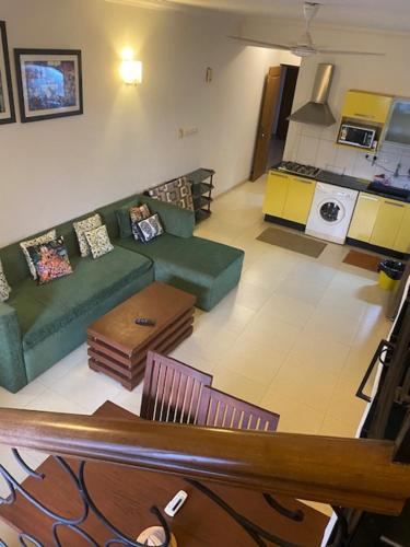 pool facing apartment in riviera foothills near baga arpoara