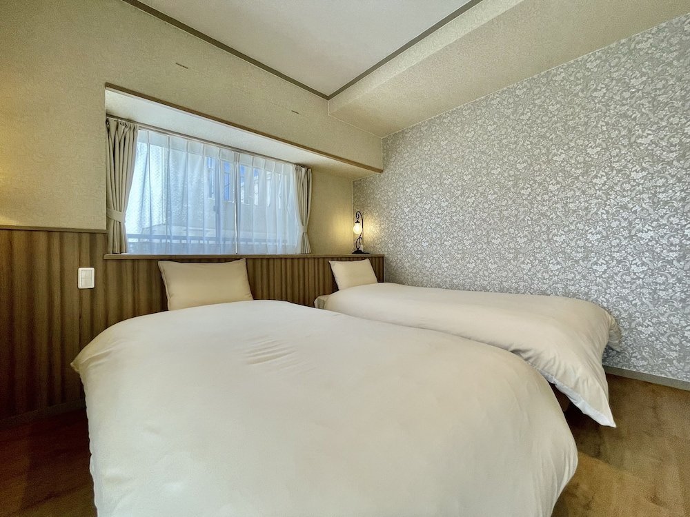 hotel tenshi kan kumoji