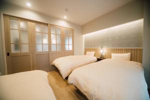 hotel tenshi kan kumoji