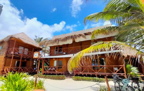 palmeras de mahahual cabanas