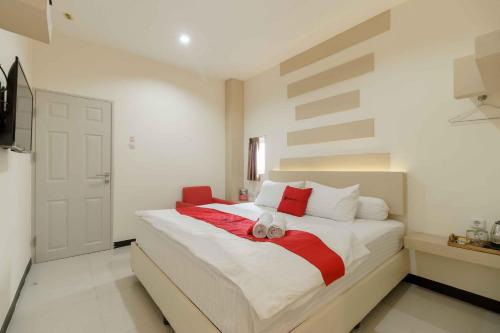 reddoorz plus near millenium ict centre medan 2