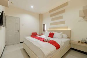 reddoorz plus near millenium ict centre medan 2