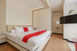 reddoorz plus near millenium ict centre medan 2