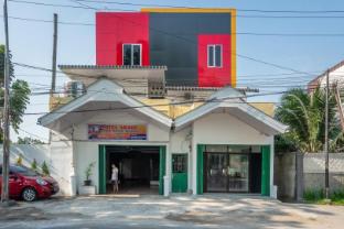 reddoorz near manhattan times square medan 2