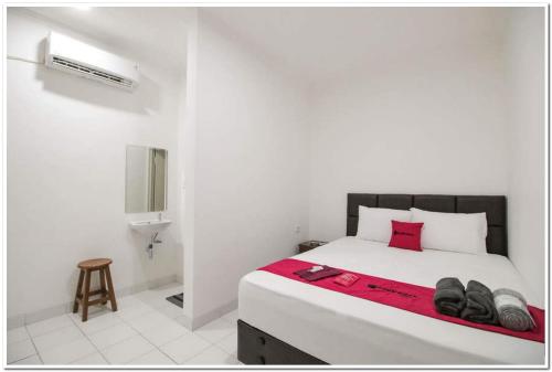 reddoorz ruko itc roxy mas