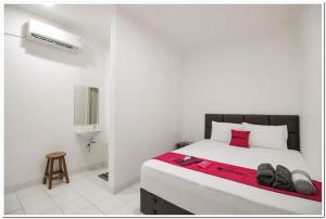 reddoorz ruko itc roxy mas