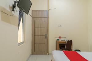 reddoorz jalan kolonel haji burlian palembang 2