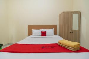 reddoorz jalan kolonel haji burlian palembang 2