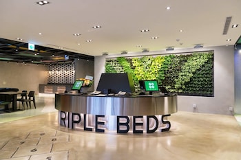 green world triplebeds hotel