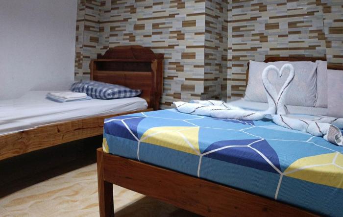 aandc aquinos guesthouse and motorbike rental moalboal