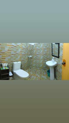 aandc aquinos guesthouse and motorbike rental moalboal