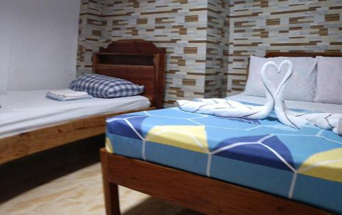 aandc aquinos guesthouse and motorbike rental moalboal