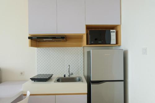 compact 1br at tree park apartment