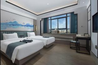 elan hotel wuhu economic development zone baixian plaza polka