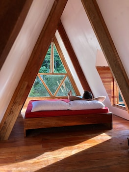 a frame volcano house