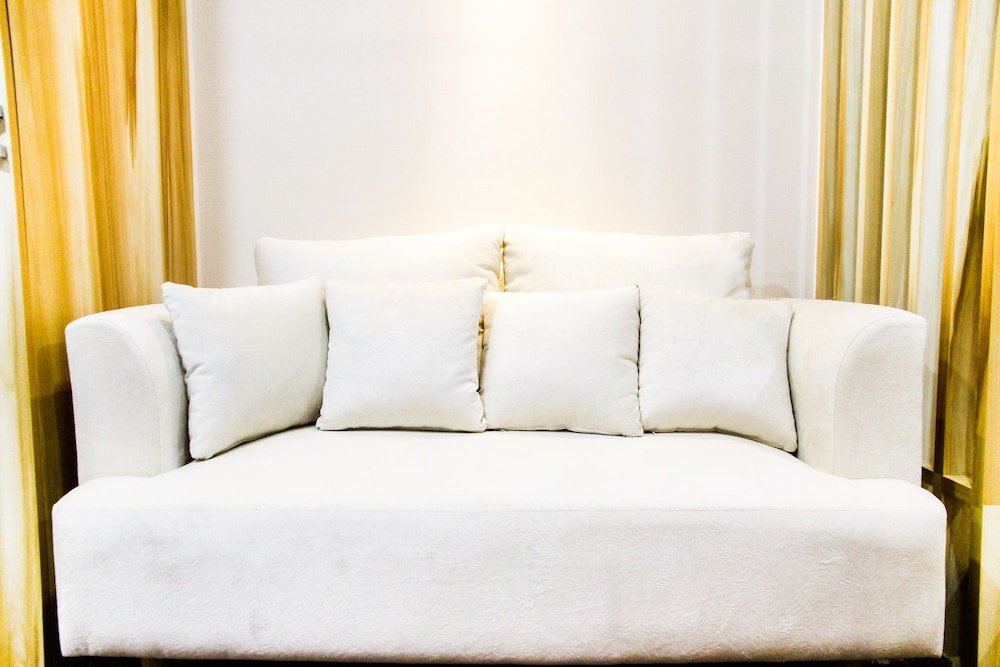 modern style the oasis studio apartment with comfortable sofa