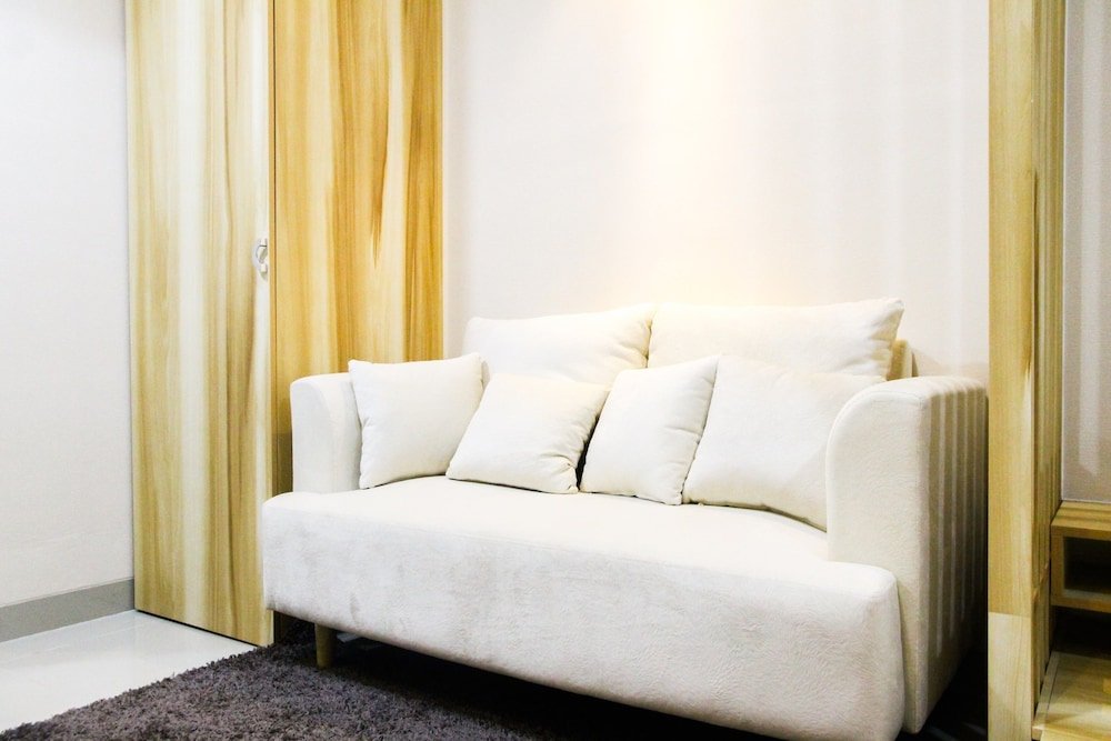 modern style the oasis studio apartment with comfortable sofa