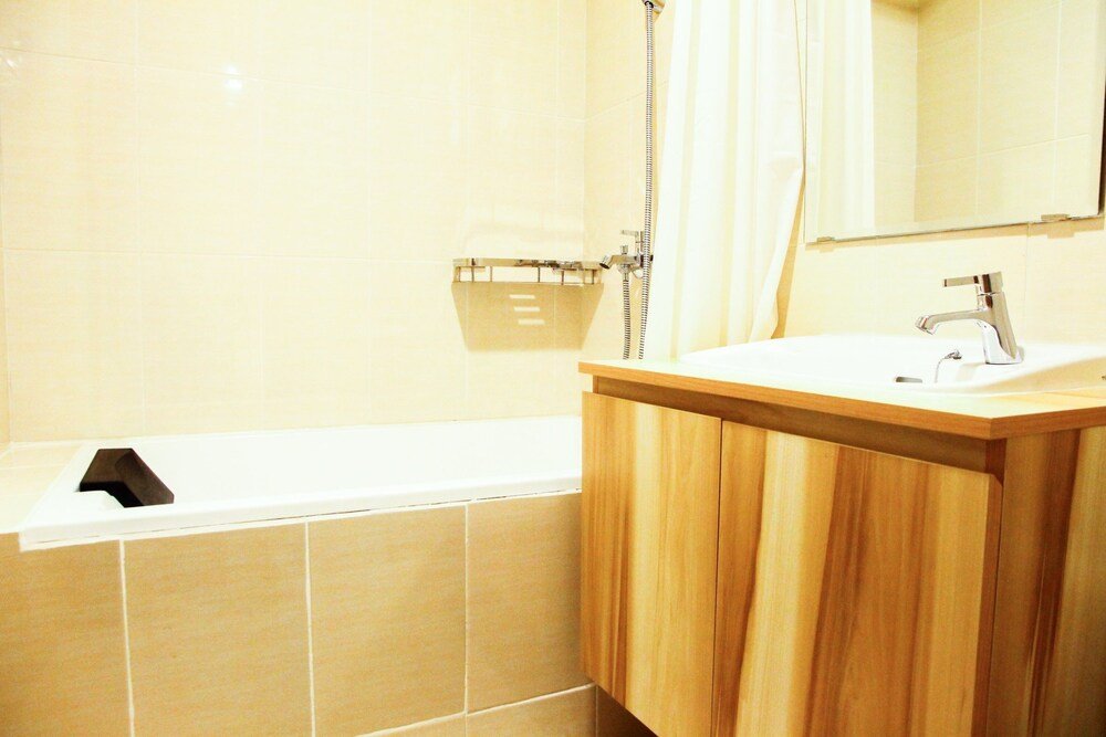 modern style the oasis studio apartment with comfortable sofa