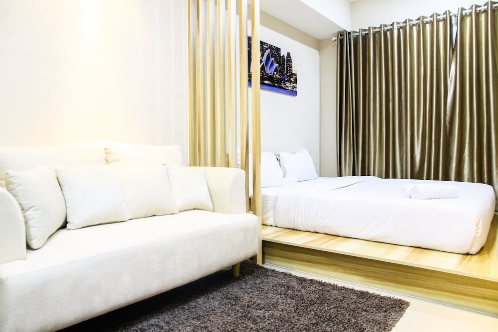 modern style the oasis studio apartment with comfortable sofa