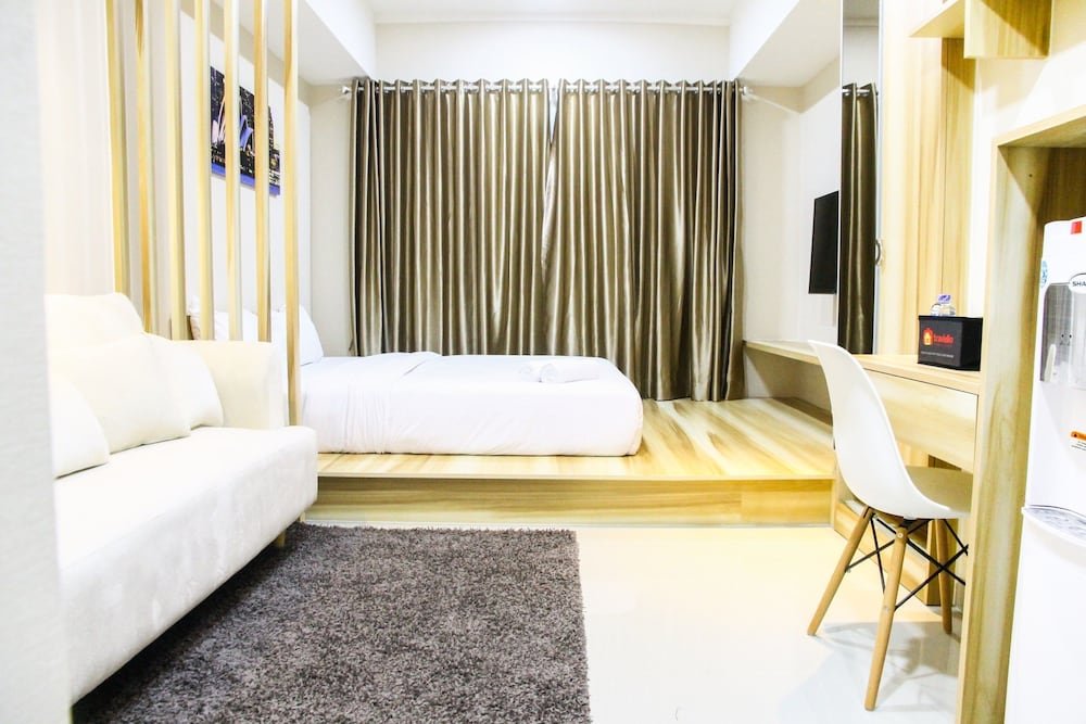 modern style the oasis studio apartment with comfortable sofa