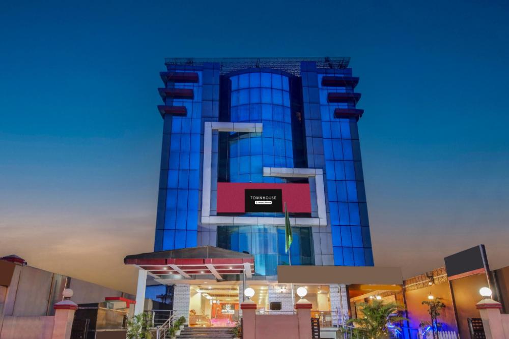 super townhouse hatigaon near medicity formerly hotel grand majesty