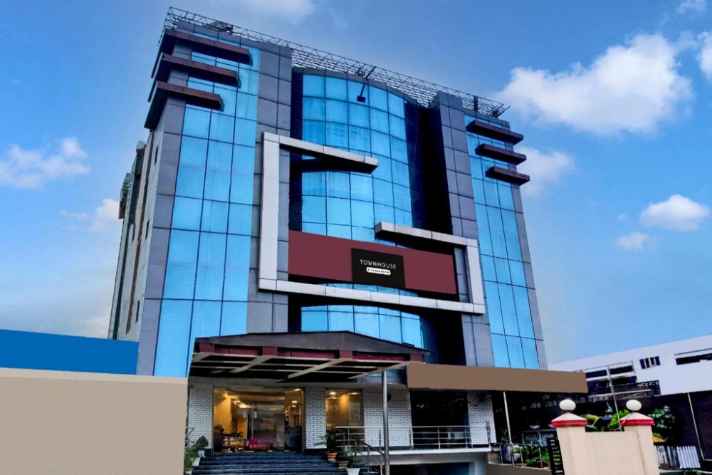 super townhouse hatigaon near medicity formerly hotel grand majesty