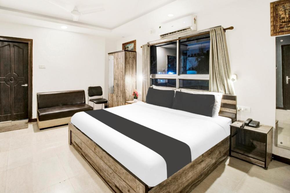 super townhouse hatigaon near medicity formerly hotel grand majesty