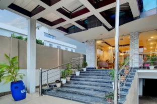 super townhouse hatigaon near medicity formerly hotel grand majesty