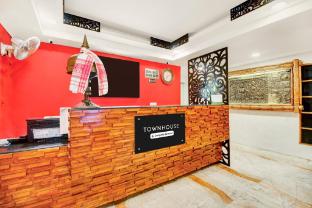 super townhouse hatigaon near medicity formerly hotel grand majesty