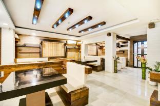 super townhouse hatigaon near medicity formerly hotel grand majesty