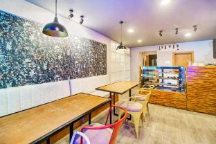 super townhouse hatigaon near medicity formerly hotel grand majesty