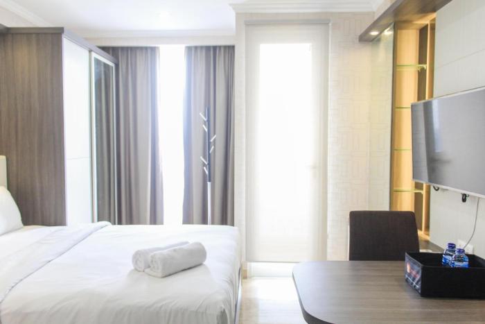 nice studio menteng park apartment by travelio