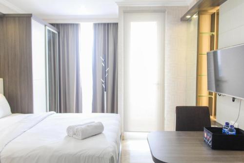 nice studio menteng park apartment by travelio