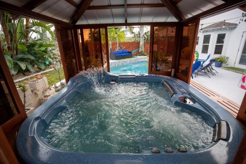 urban oasis withhot tub heated pool and private movie theater home