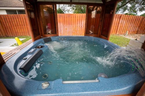 urban oasis withhot tub heated pool and private movie theater home