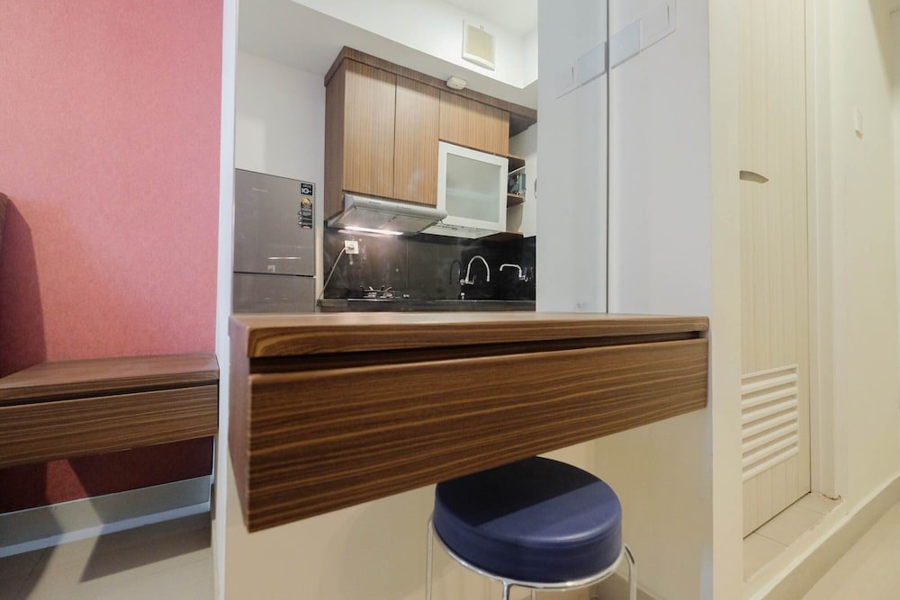 homey studio room at grand kamala lagoon apartment