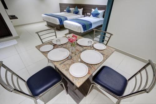 orange suites and inn bangalore airport